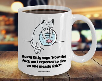Kussy Kitty Says "How The Fuck Am I Expected To Live On One Measly Fish?" Offensive Coffee Mug - Gift For Cat Lovers (9 Options Available)