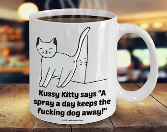 Kussy Kitty Says "A Spray A Day Keeps The Fucking Dog Away" Offensive Coffee Mug - Great Gift For Cat Lovers (9 Options Available)