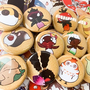 May include: A collection of 10 round, brown button pins with various cartoon characters. The characters include a black and white hamster, a black and white owl, a black and white creature with a red bow, a black and white creature with a red bow and a red flower, a black and white creature with a red bow and a green plant, a black and white creature with a red bow and a purple gem, a black and white creature with a red bow and a red flower, a black and white creature with a red bow and a green plant, a black and white creature with a red bow and a purple gem, and a black and white creature with a red bow and a red flower.