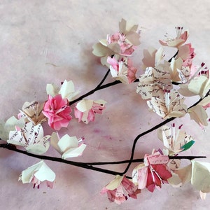 Japanese cherry blossom branches in origami Romantic pink sakura flowers for flower bouquet arrangement, wedding table decoration, baptism