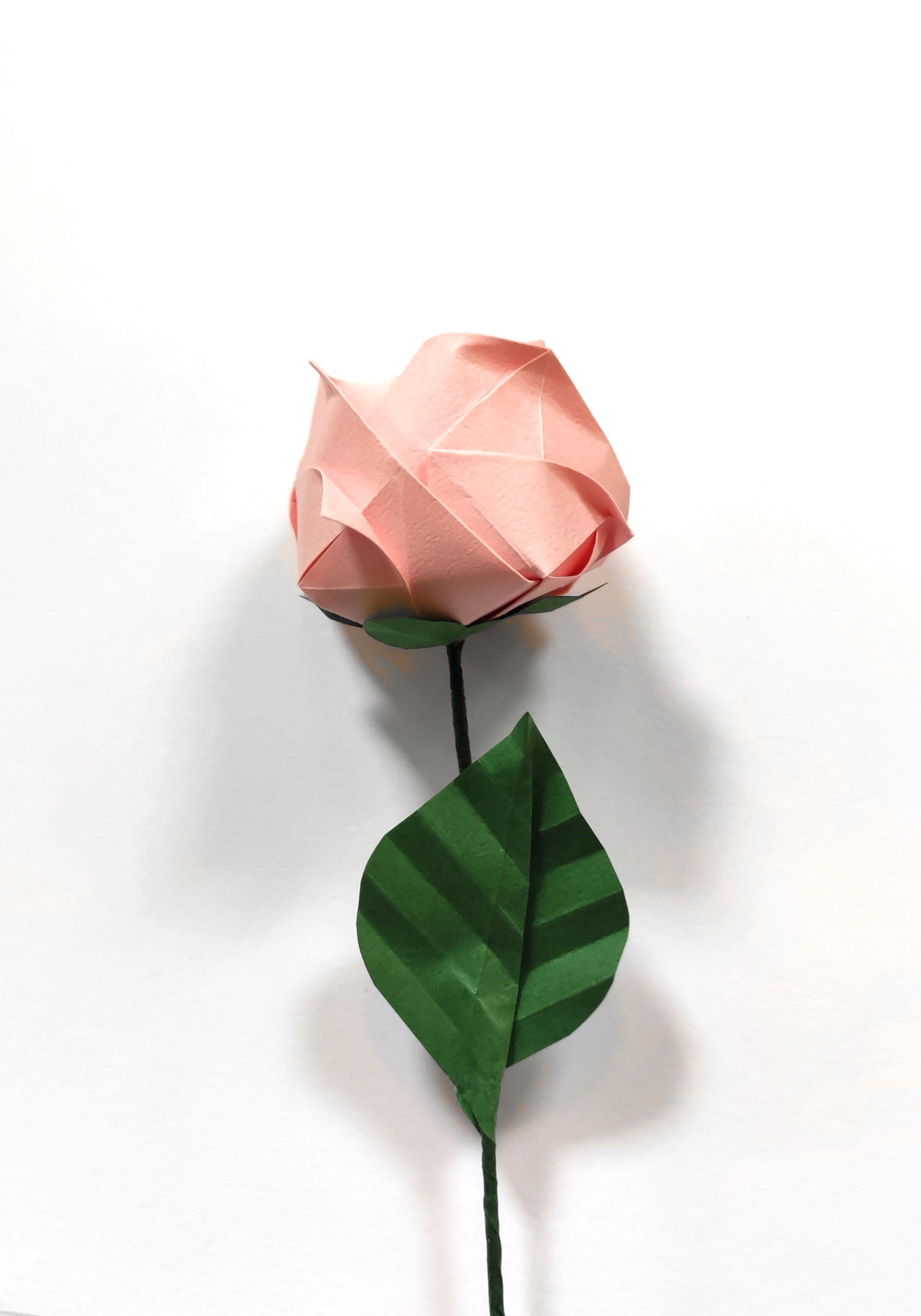 Pink origami rose to create bouquets, celebrate a wedding anniversary, give as a Valentine's Day gift and treat yourself
