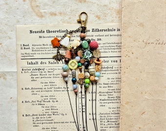 Gland coloré de journal indésirable fait de différentes perles, embellissements de journal indésirable, charme pour journal indésirable