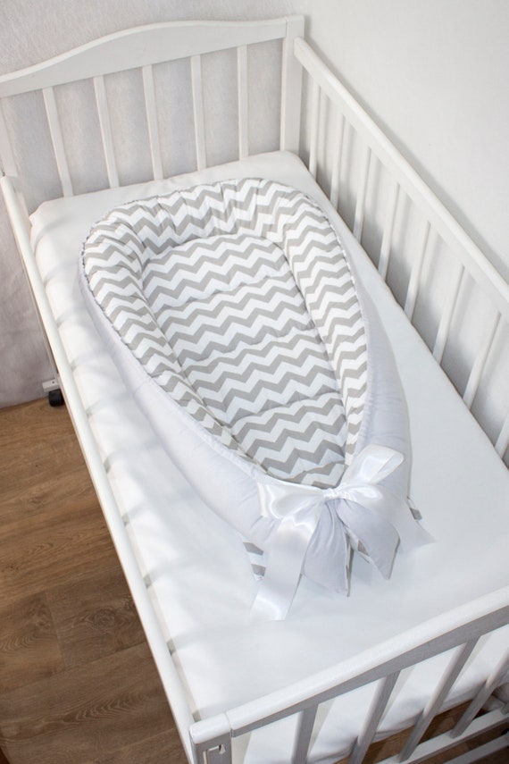 grey baby cot