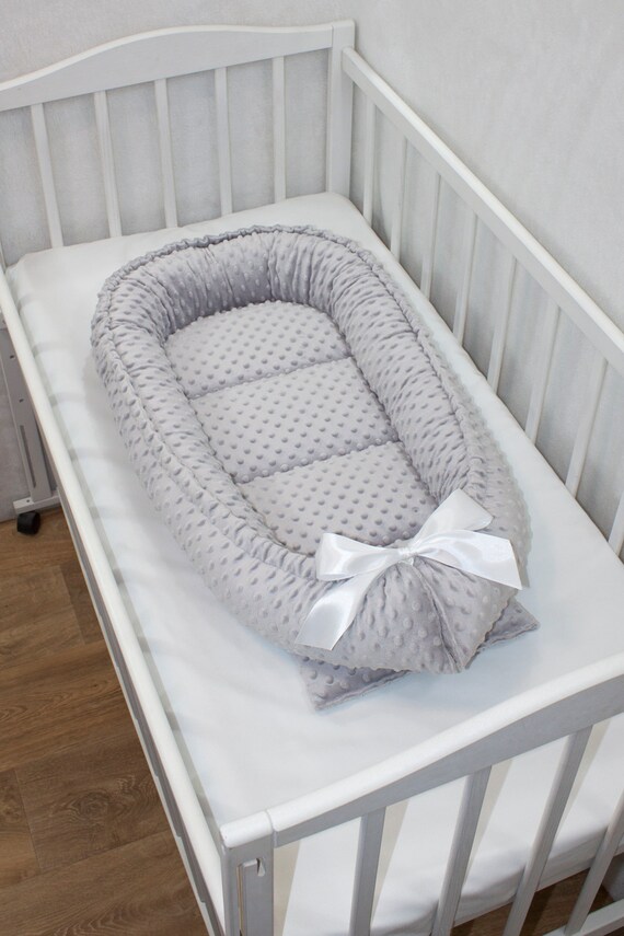 gray baby bed