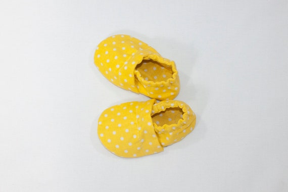 yellow and white polka dot shoes