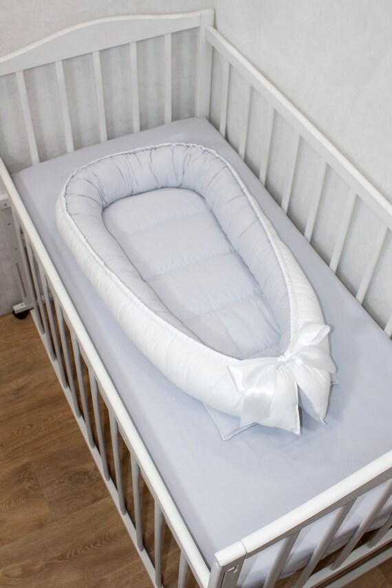 white baby bed