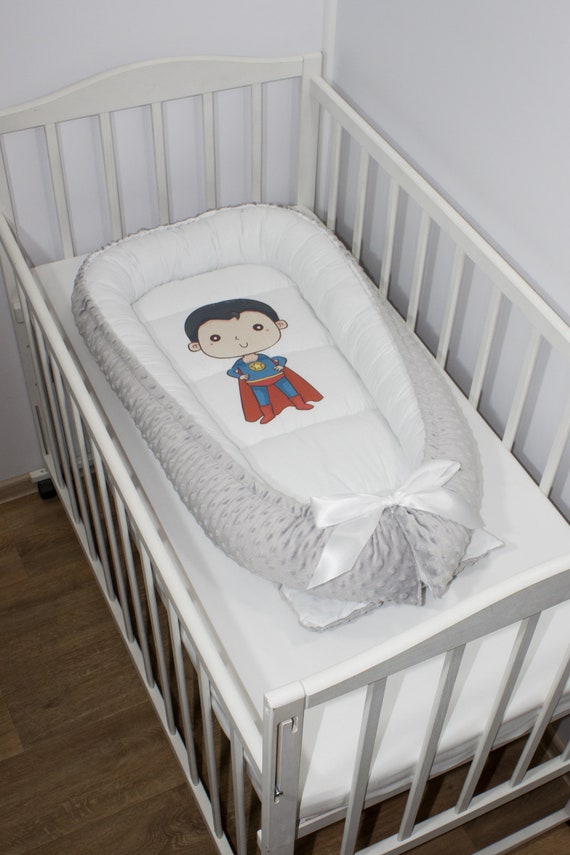 transitioning baby from dock a tot to crib