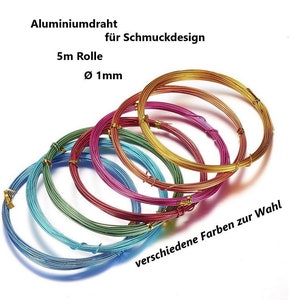Könnte beinhalten: Nahaufnahme von bunten Aluminiumdrahtspulen, jede 5 Meter lang und 1 mm im Durchmesser. Der Draht ist ideal für die Schmuckherstellung und das Basteln.