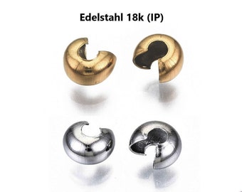 May include: Four small, open-ended, half-sphere beads. Two are gold-colored, and two are silver-colored. The text "Edelstahl 18k (IP)" is at the top of the image. These beads are likely used in jewelry making.