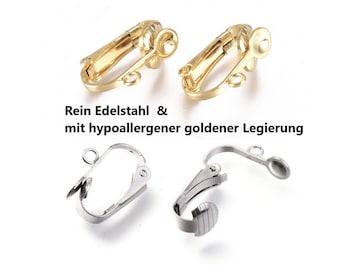 Puede incluir: Dos pares de clips para pendientes, un par es dorado y el otro es plateado. El texto "Rein Edelstahl & mit hypoallergener goldener Legierung" es visible en la imagen.