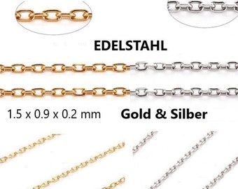 Puede incluir: Eslabones de cadena de oro y plata en primer plano. Los eslabones de la cadena miden 1,5 x 0,9 x 0,2 mm. El texto "EDELSTAHL" es visible en la imagen. El texto "Gold & Silber" también es visible en la imagen.