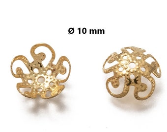 May include: Two gold-colored metal bead caps with a decorative, openwork design. The caps are 10 mm in diameter.