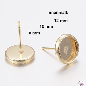 May include: Two gold-toned earring settings with a round, flat base and a post. The earring settings are 8 mm in diameter and 12 mm in total length. The text "Innenmaß: 12 mm" and "10 mm" is visible in the image.
