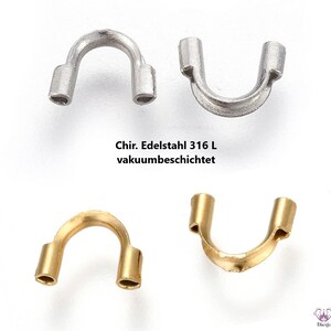 Könnte beinhalten: Vier metallische Schmuckzubehörteile in U-Form, zwei silberfarbene und zwei goldfarbene. Die silberfarbenen Schmuckzubehörteile tragen den Text "Chir. Edelstahl 316 L vakuumbeschichtet". Die goldfarbenen Schmuckzubehörteile haben eine ähnliche Form. Diese Schmuckzubehörteile werden in der Schmuckherstellung verwendet.