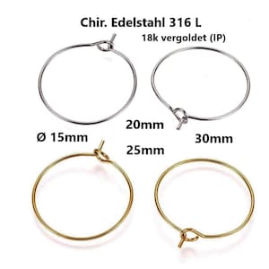Peut inclure: Quatre créoles en deux tailles, 15 mm et 30 mm. Les plus petites créoles sont plaquées or et les plus grandes sont argentées. Le texte "Chir. Edelstahl 316 L 18k vergoldet (IP)" est visible sur l'image.