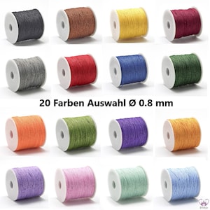 May include: Twenty spools of 0.8 mm cord in various colors, including black, brown, yellow, red, gray, green, orange, purple, light blue, and pink.  The spools are arranged in rows on a white background.