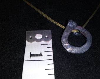 Forged horseshoe pendant