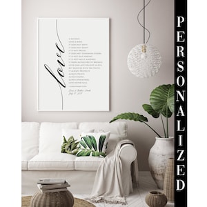 May include: A black and white printable wall art print with a quote about love from 1 Corinthians 13:4-8. The quote is surrounded by a decorative script font that says "love". The print is framed and hanging on a wall in a living room setting.