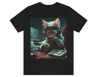 May include: A black t-shirt with a graphic of a cat wearing headphones and sitting at a computer desk. The cat is looking at the computer screen and has a serious expression on its face.
