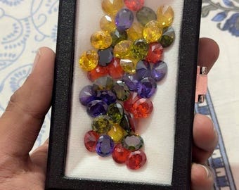 Veelkleurige partij van 10 stuks, zirkoonsteen ovale vorm, partij losse edelstenen, 10 x 12 mm, partij gefacetteerde zirkonia's.