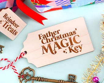 May include: A wooden tag with the words "Father Christmas' MAGIC Key" and a decorative key. The tag is tied with red and white twine. A smaller wooden tag reads "Reindeer Treats". Festive holiday theme.