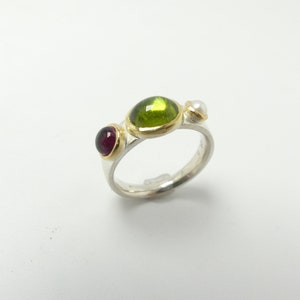 Silver ring with gemstones and pearl
