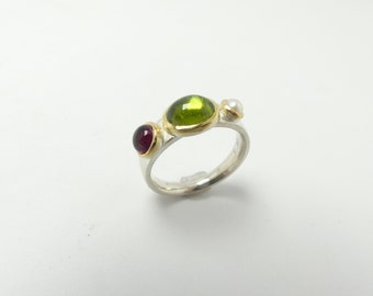 Silver ring with gemstones and pearl