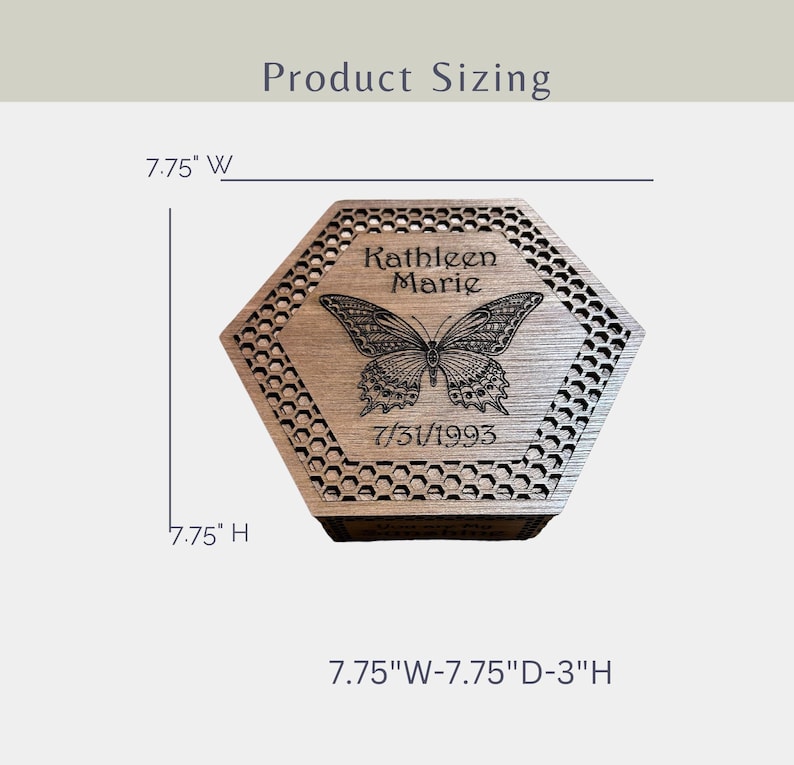 May include: A wooden, hexagonal box with a butterfly engraving and the name "Kathleen Marie" and the date "7/31/1993". The box is 7.75 inches wide, 7.75 inches high, and 3 inches deep. The box has a honeycomb pattern around the edges.
