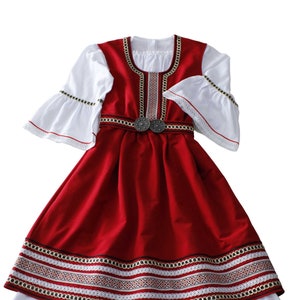 An original modern version of a folk costume for a girl.