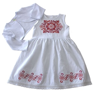 An original modern version of a folk costume for a girl.