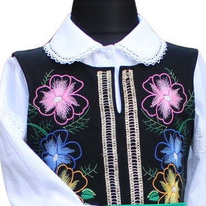 An original modern version of a Polish folk costume for a girl
