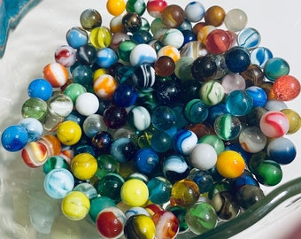 Collection of more than 100 Vintage Marbles with Antique Green Ball Mason Jar