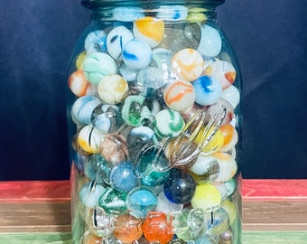 Antique Green Ball Mason Jar with Collection of more than 100 Vintage Marbles