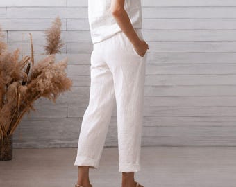 Pantalones de lino blanco. Pantalones de lino puro para mujer. Pantalones de vacaciones para chicas. Estilo de diseñador.