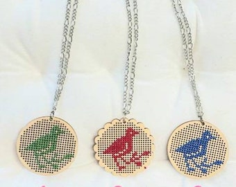 Embroidered pendant in wood / necklace