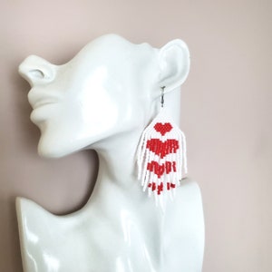 Earrings on mannequin