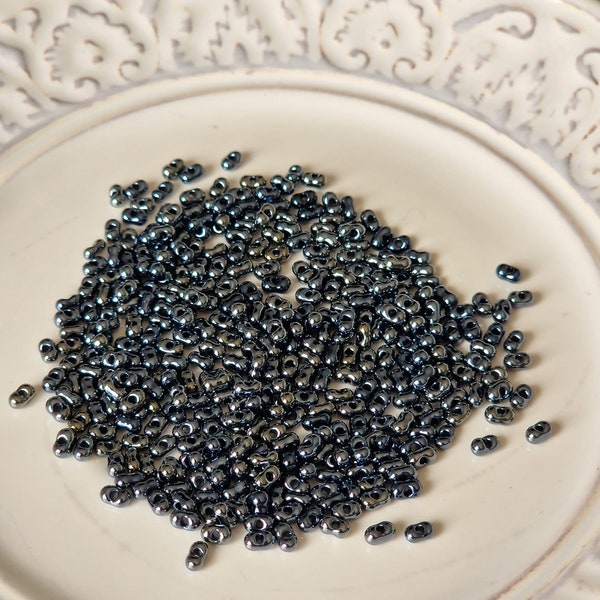 Preciosa Seed Beads 20 gr, mini farfalle, hematit/antracit