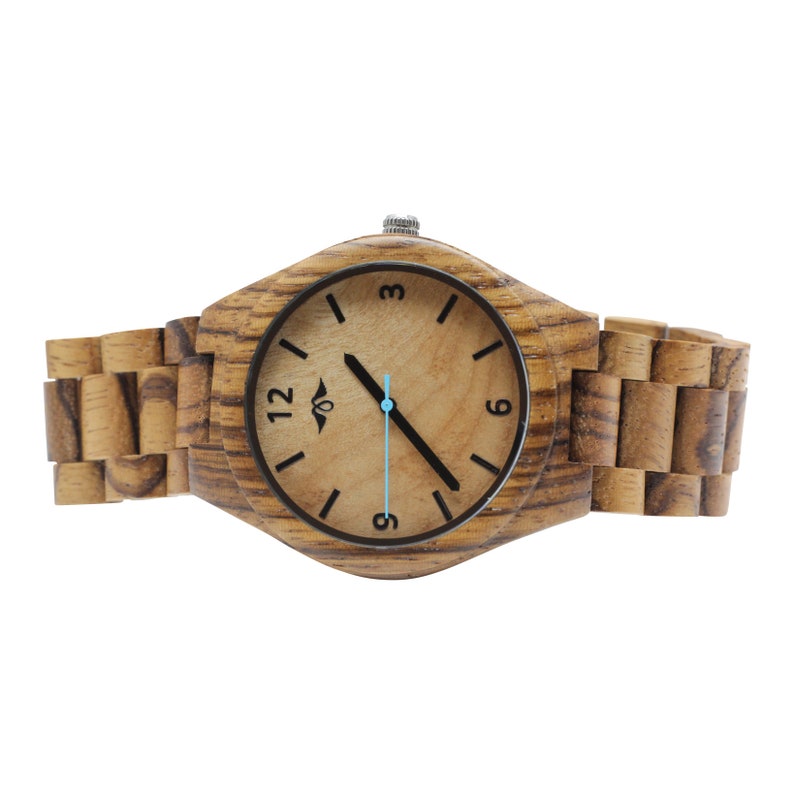 May include: A wooden wristwatch with a brown wood band and a light brown face. The watch face has black numbers and hands, and a blue second hand.