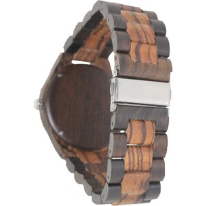 May include: A brown wooden wristwatch with a dark brown wood face and a brown and tan wood band. The watch has a silver metal clasp.