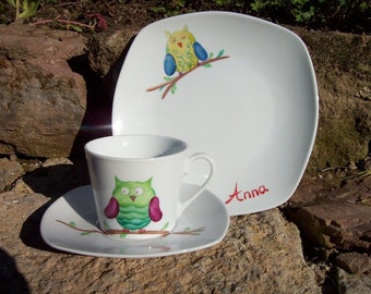 Children's set with colorful owl in desired color hand painted from cup and breakfast plate made of porcelain