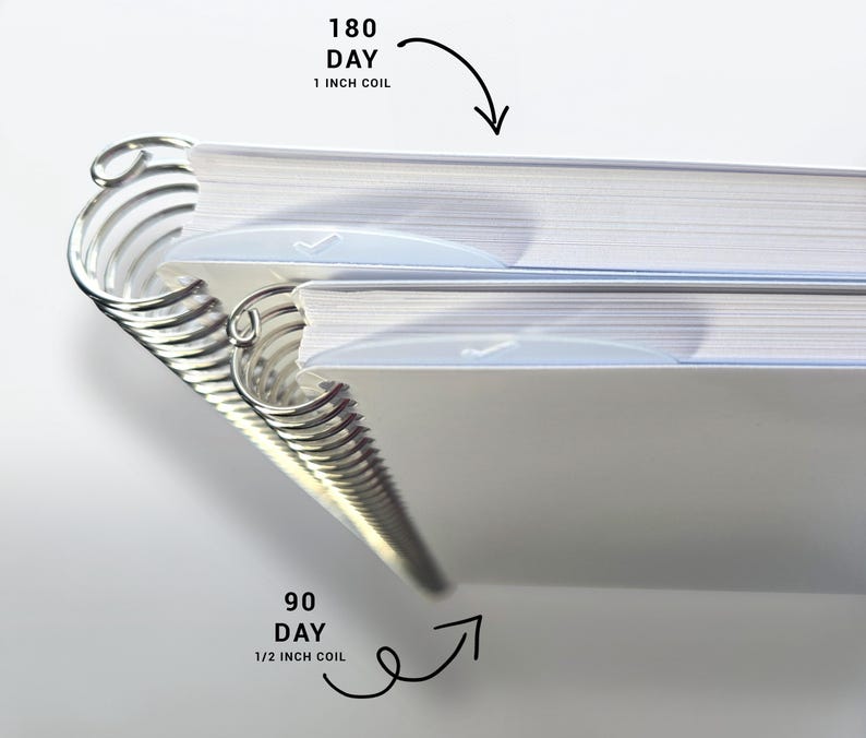 a close up of a book with a spiral design