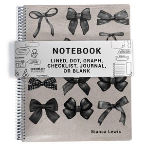 May include: A spiral-bound notebook with a tan cover featuring various black bow illustrations. A white paper band wraps around the center with the text: NOTEBOOK LINED, DOT, GRAPH, CHECKLIST, JOURNAL, OR BLANK, CHECKLIST PLANNERS, and Bianca Lewis.