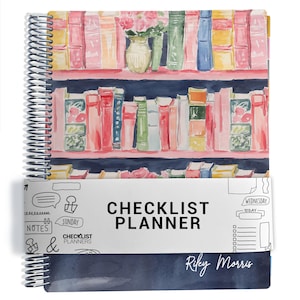 May include: A spiral-bound planner featuring a watercolour bookshelf cover with colourful books and a vase of flowers. A white paper band wraps around the centre with the text CHECKLIST PLANNER and Riley Morris printed on the bottom cover.