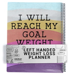 May include: A spiral-bound weight loss planner with a colourful watercolour design. The cover reads "I WILL REACH MY GOAL WEIGHT." The planner includes the text "LEFT HANDED WEIGHT LOSS PLANNER" and has sections for notes and checklists.
