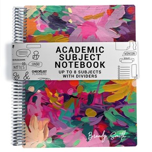 May include: A spiral-bound academic subject notebook featuring a vibrant, multi-colored abstract floral pattern. A white paper band wraps around the center with the black text ACADEMIC SUBJECT NOTEBOOK UP TO 8 SUBJECTS WITH DIVIDERS and the name Brandy Smith.