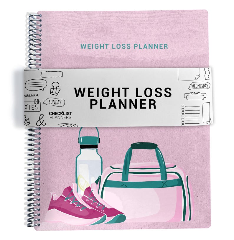a weight loss planner with a pink background