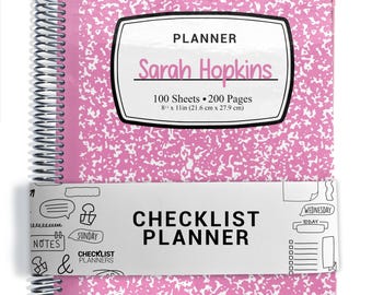 May include: A spiral-bound planner with a pink and white speckled cover. The center label reads PLANNER, Sarah Hopkins, 100 Sheets, 200 Pages, 8.5 x 11 inches. A white belly band features the text CHECKLIST PLANNER and various icons.