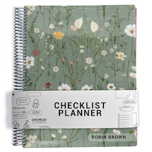 May include: A spiral-bound planner with a sage green cover featuring a white and yellow wildflower pattern. A white paper band wraps around the center, printed with the text CHECKLIST PLANNER, CHECKLIST PLANNERS, and ROBIN BROWN.