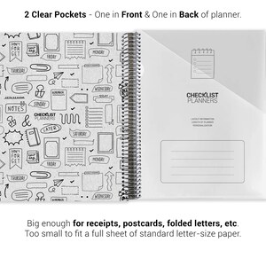 a spiral-bound notebook with two clear pockets, one in front and one in back of a planner. The notebook has a black and white design with various icons and text, and it is too small to fit a full sheet of standard letter-size paper.