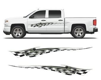 May include: A white pickup truck with a checkered flag graphic decal on the side. The decal is green and black and has a flame-like design.